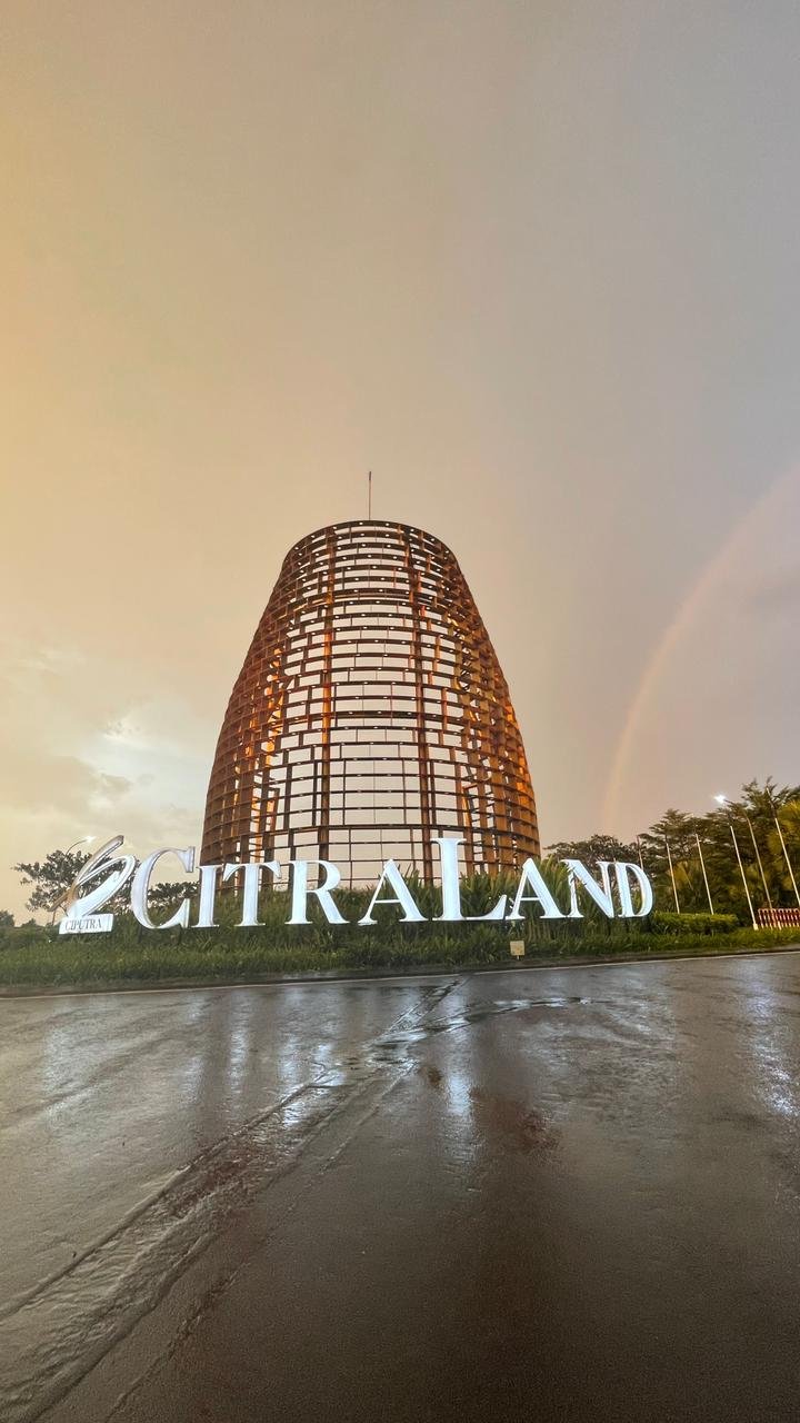 a rainbow - lite rainbow over a rainbow - lit sky